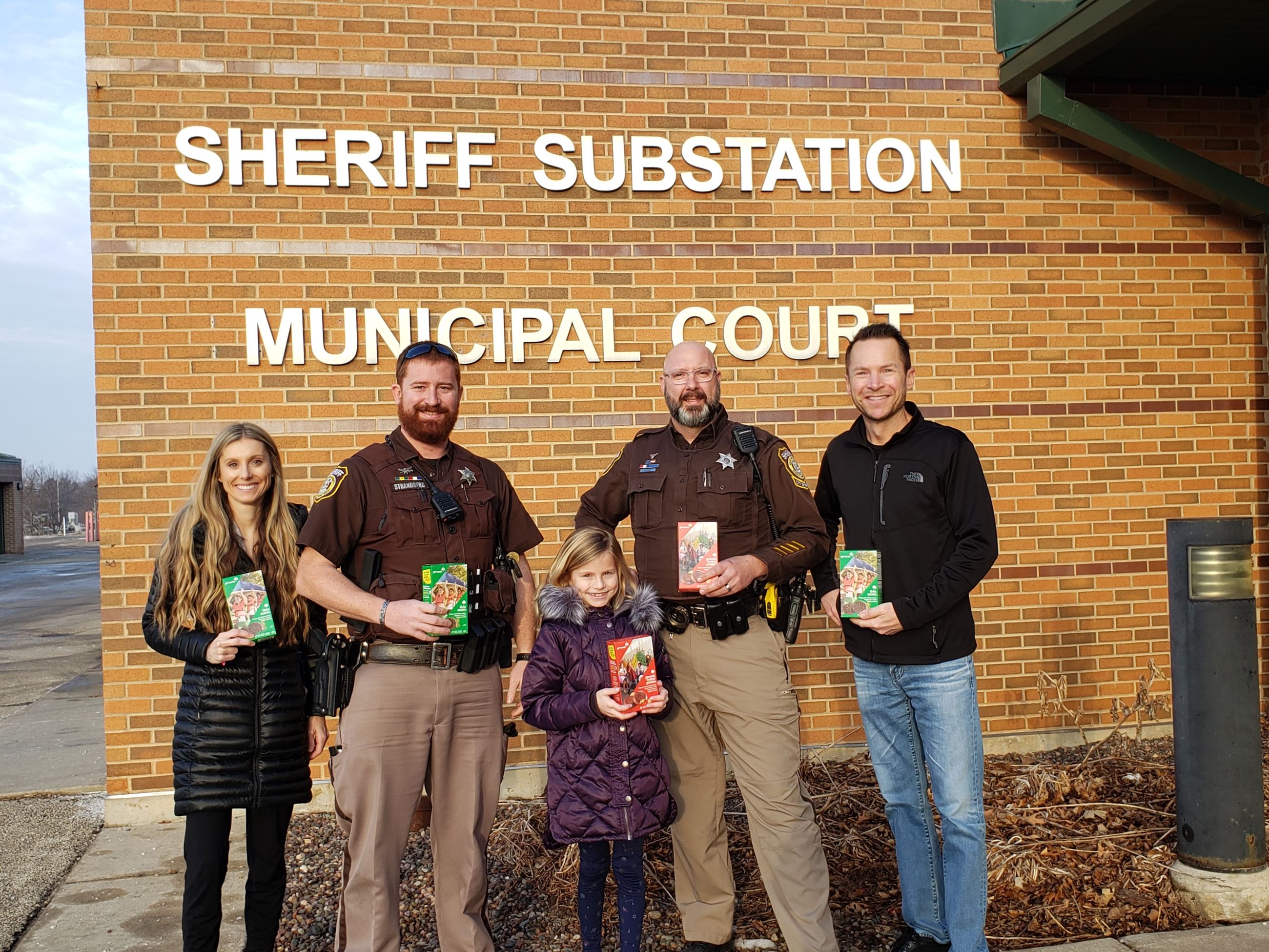 Girl Scout donates cookies to Deputies